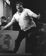 Jocky Wilson celebrates during the World Darts Championship in 1989.jpeg